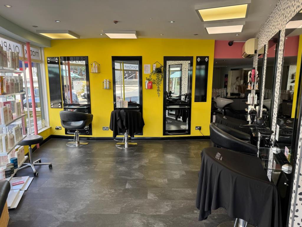 Lot: 114 - FREEHOLD FOUR STOREY TOWN CENTRE SHOP AND UPPER PARTS WITH CONVERSION POTENTIAL - Hair dressing area with treatment chairs